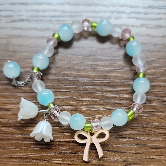 Beaded Bracelet with Bow and Flower Charms - Picture 1 of 2